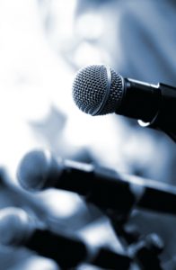 Microphones set up for public speaking Atlanta engagements
